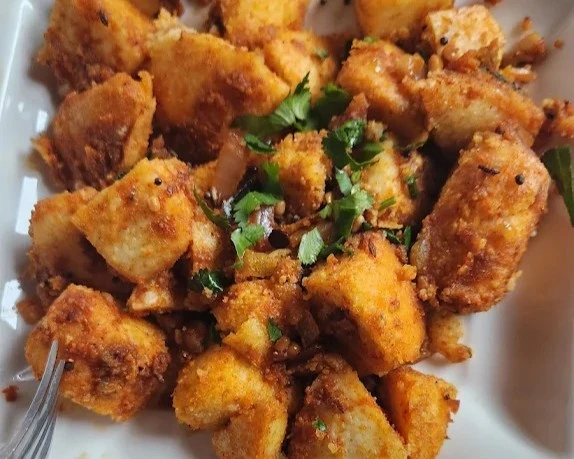 Masala Ghee Podi Idli - Spiced idli with ghee and podi at Krishna's Dosa Grill Regina